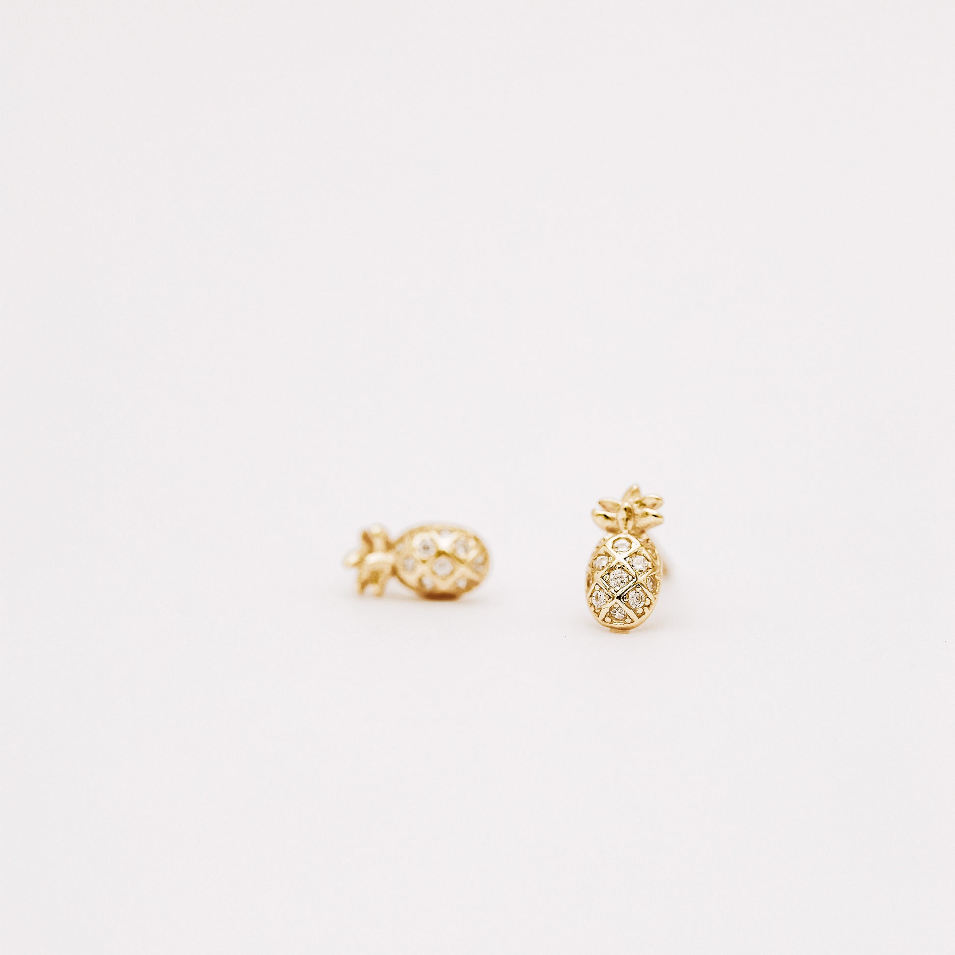 Dainty gold pineapple earrings for everyday wear