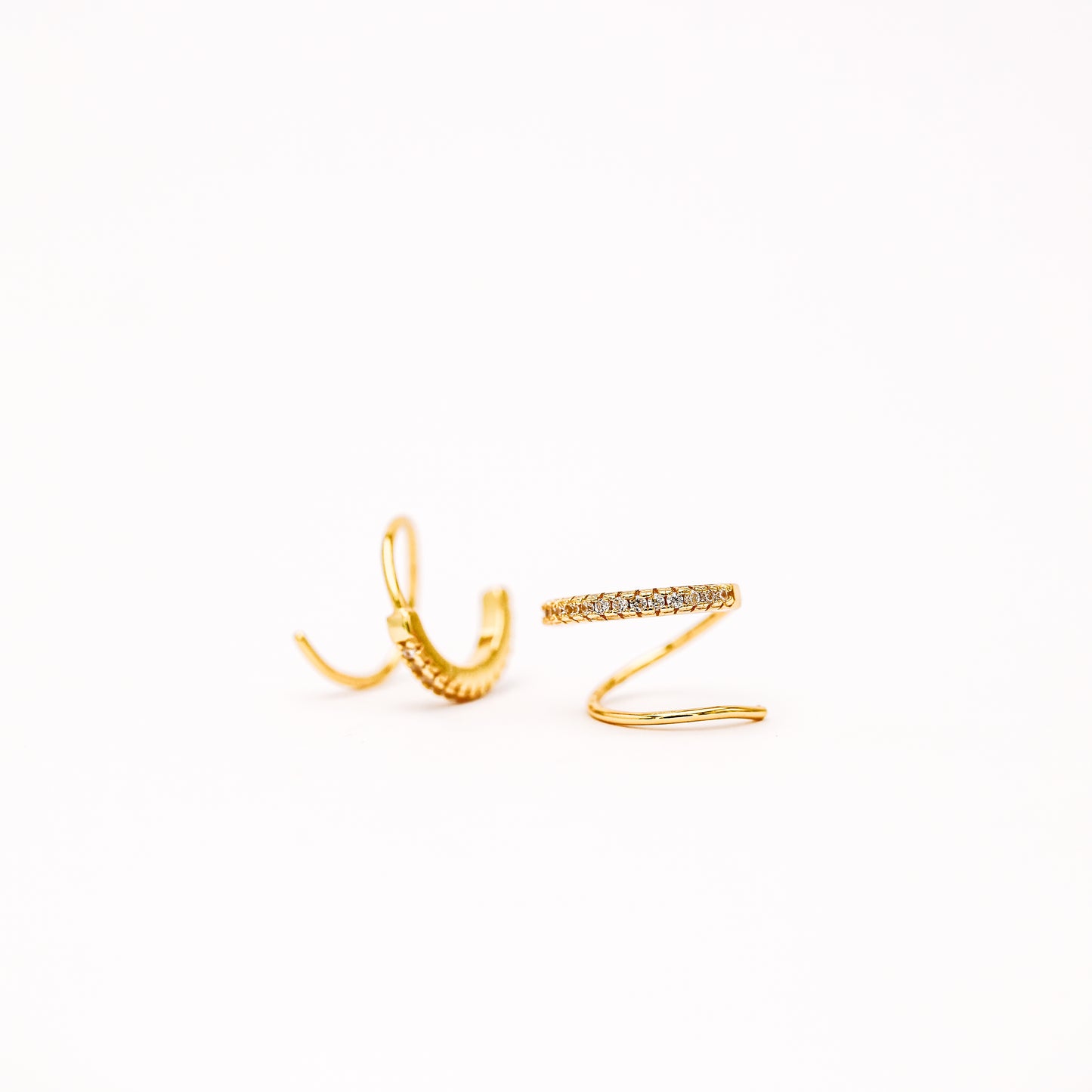 Single piercing double hoop illusion huggie earring close up